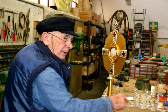 Enzo Segatel with a monstrance in his workshop